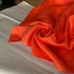 оранжевая льняная ткань
